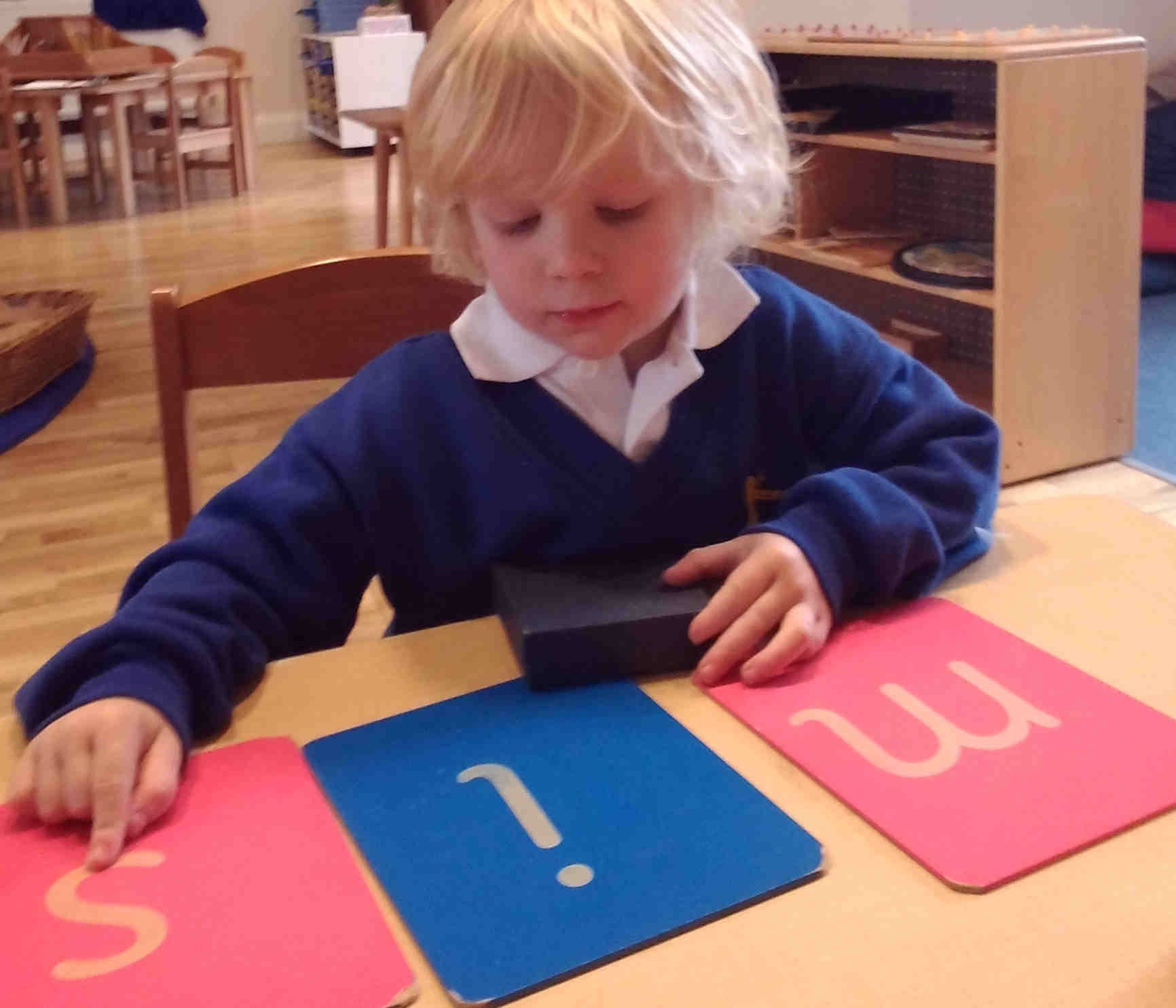 working with sandpaper letters